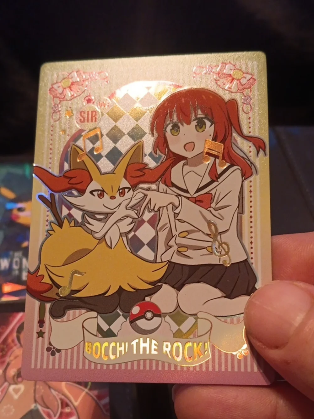 Pokemon Trading Card with Yellow, Red, White, Black, Pink, Gold Accents